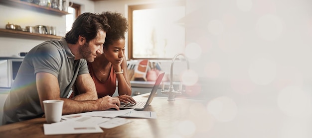 Laptop space and an interracial couple in their home for investment planning finance budget or accounting Computer mock up or banner with a man and woman reading bank information for savings