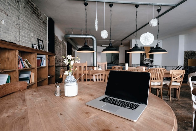 Laptop on a table in a cafe