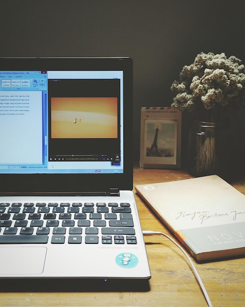 Photo laptop on table at home office