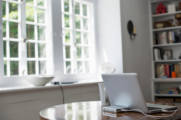 Laptop on a table in a home office