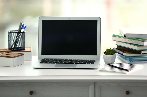 Laptop on the table in the office