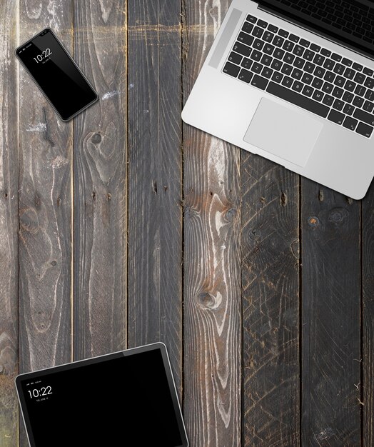 Laptop, tablet and phone set  on a wooden background. 3D render