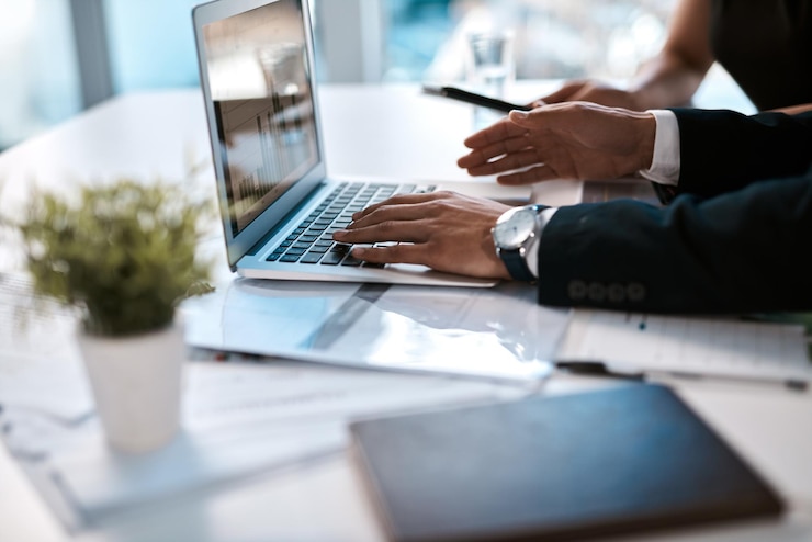 Photo laptop teamwork and hands of people for business plan research and online stats for data analysis charts graphs and collaboration at computer for sales development profit or finance in office