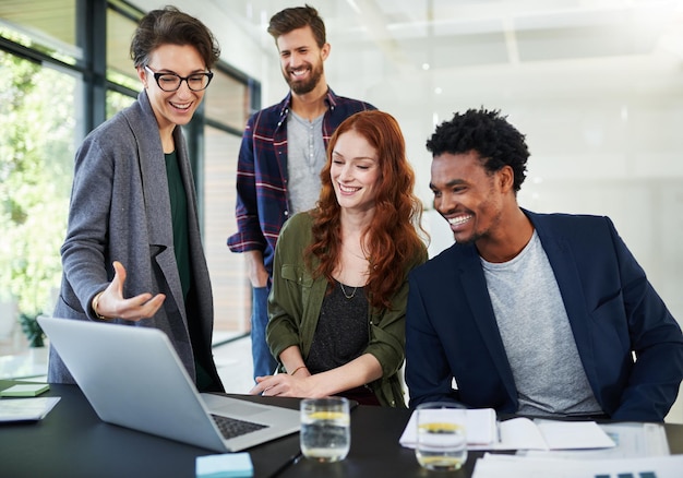 laptop teamwork or people in startup for solution conversation or discussion for tech news problem solving meeting or designers in office for planning strategy feedback or online collaboration