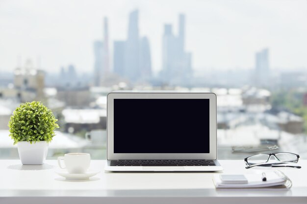 Laptop on windowsill