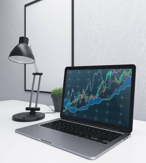 Laptop with business chart side