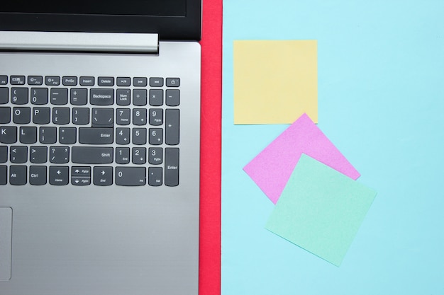 Laptop with colored sticky notes