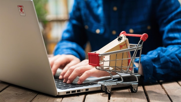 laptop with toy shopping trolley