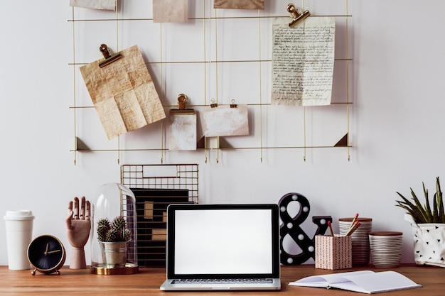 laptop on wooden desk