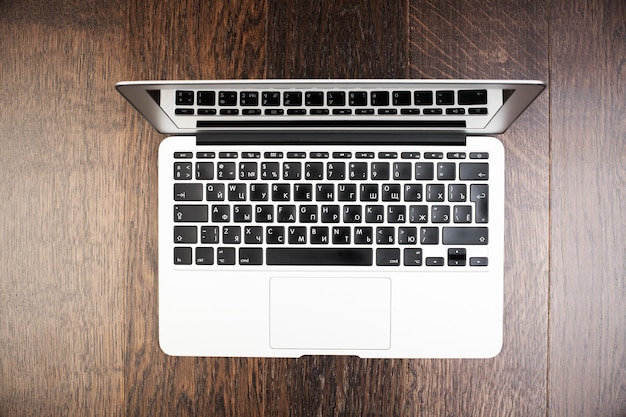 Laptop on wooden surface