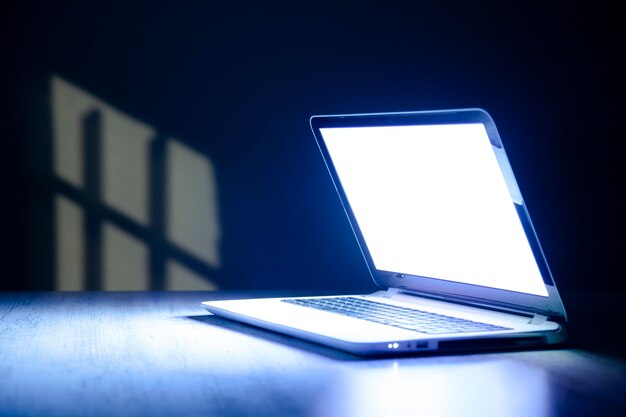 Laptop on a wooden table