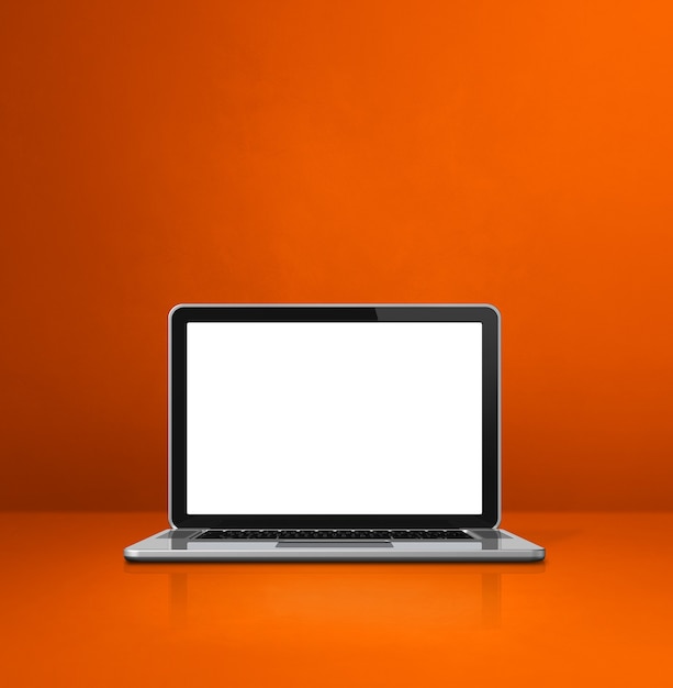 Laptopcomputer op het oranje oppervlak van de bureauscène