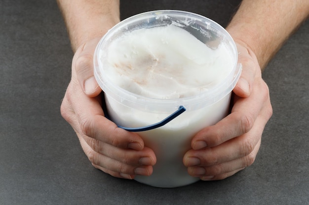 Lard in a plastic bucket