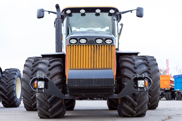 Large agricultural tractor on a white background