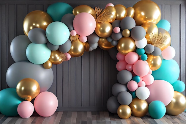 A large balloon arch with a pink and green balloon arch.