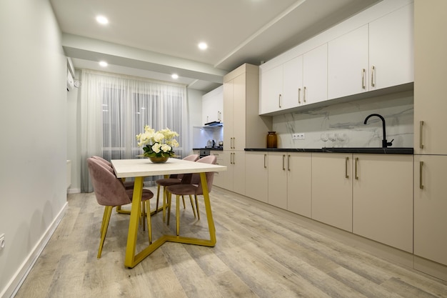 Large beige and cream luxury kitchen interior