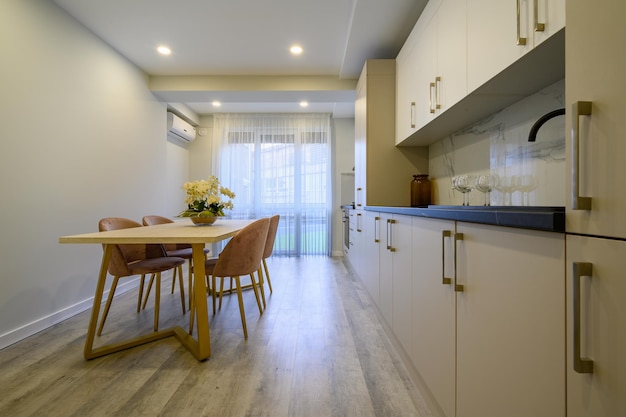 Large beige and cream luxury kitchen interior