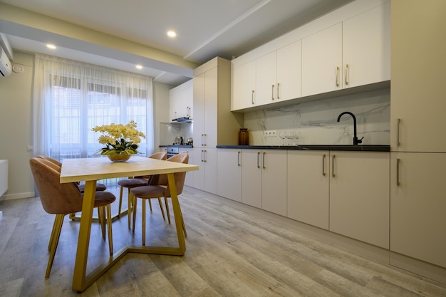 Large beige and cream luxury kitchen interior