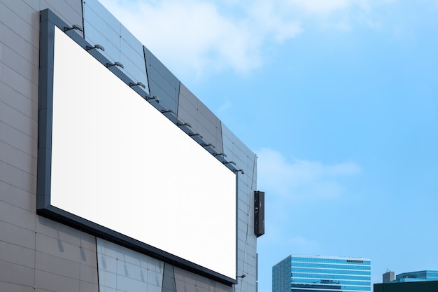 Large billboard on modern building wall