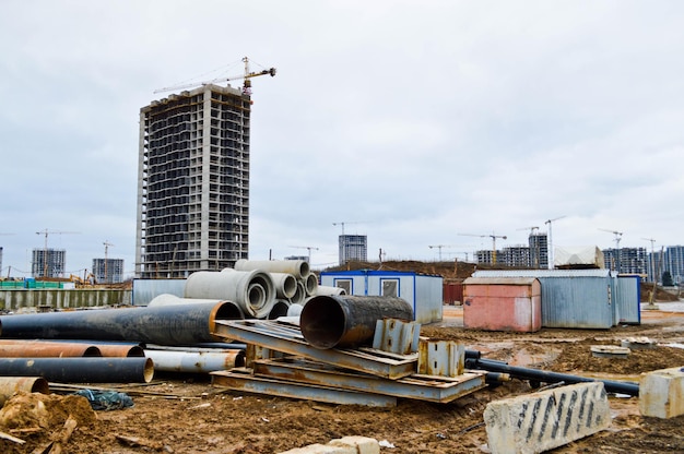 Large black plastic and concrete stone cement sewer plumbing pipes for the construction of water