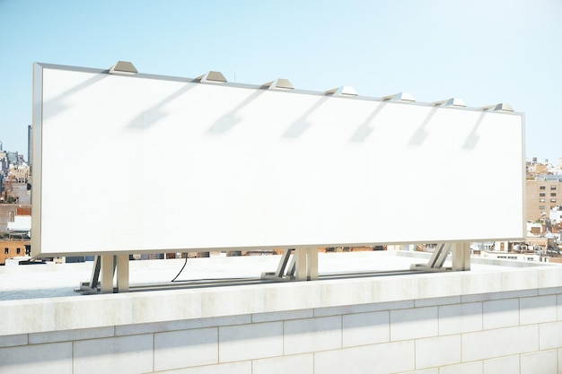 Large blank billboard on a building roof mock up