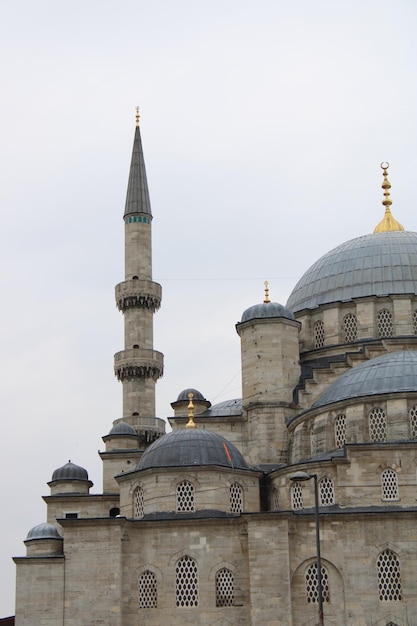 A large blue mosque with a gold roof