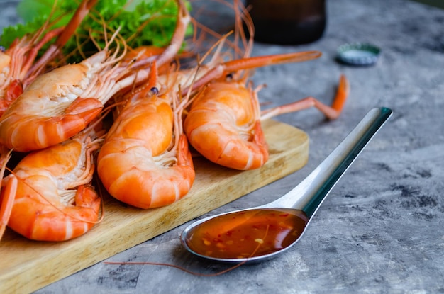 Large boiled king prawns with spicy Thai sauce