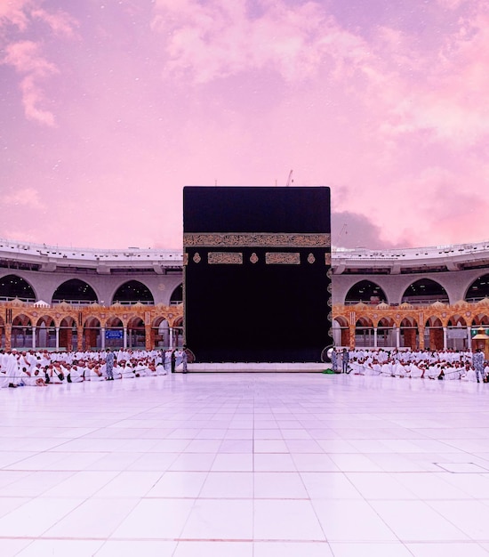 a large building with a large black structure in the middle of it mecca kaaba