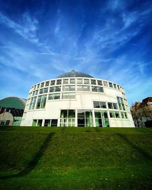 A large building with a large dome on the front