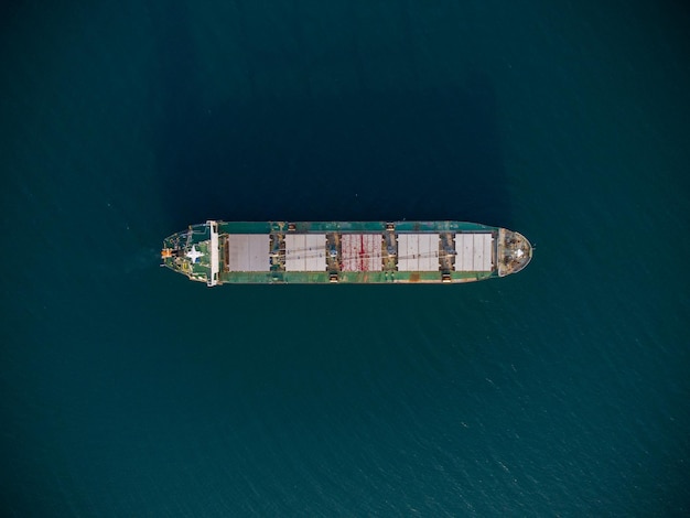 Large bulk carrier transports grain at sea aerial view