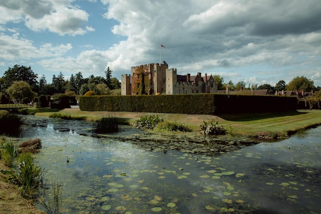 A large castle with a flag on the top of it