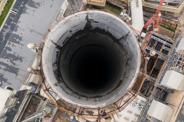 Large chimney at a power plant, close-up top view, environmental pollution