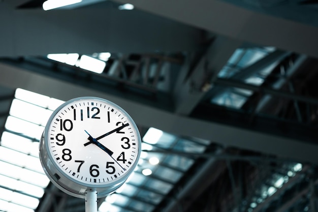 Large Clock in airport terminal Building.