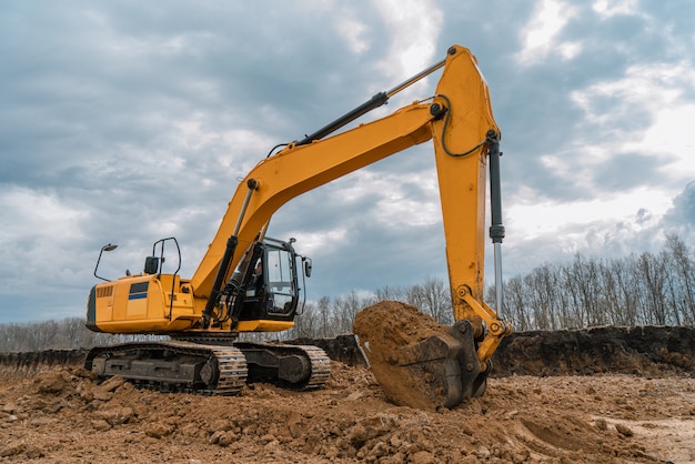 A large construction excavator on the construction site