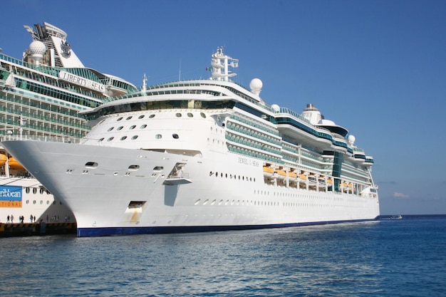 a large cruise ship is docked in the water