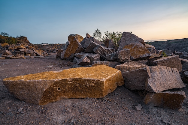 Large deposits of stone materials near a mining quarry