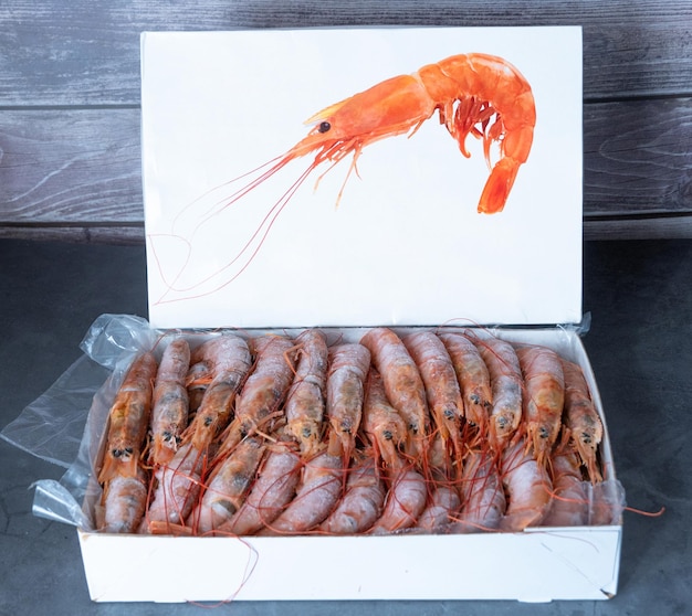 Large frozen langoustines in a package Place under the text