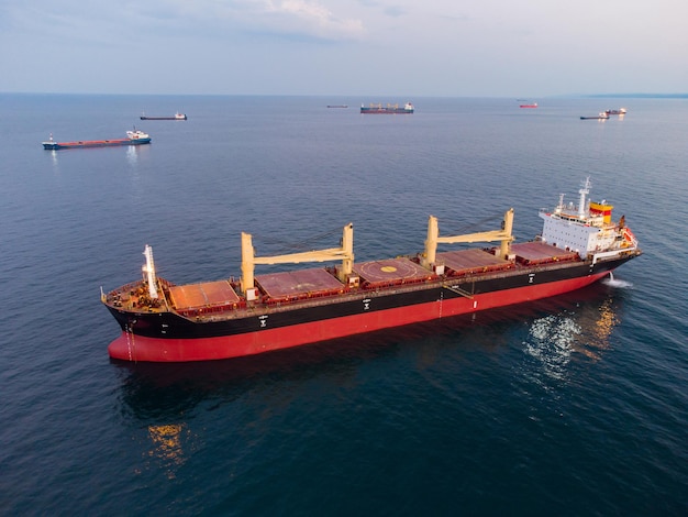 Large general cargo ship tanker bulk carrier aerial view at night