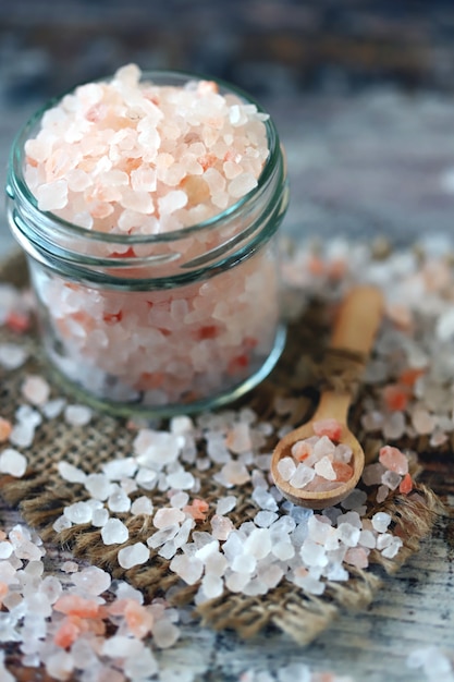 Large grains of Himalayan salt in a jar.