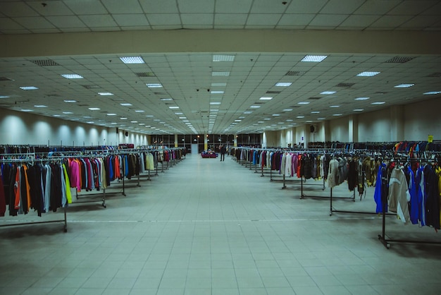 Large hall of clothes on in the store