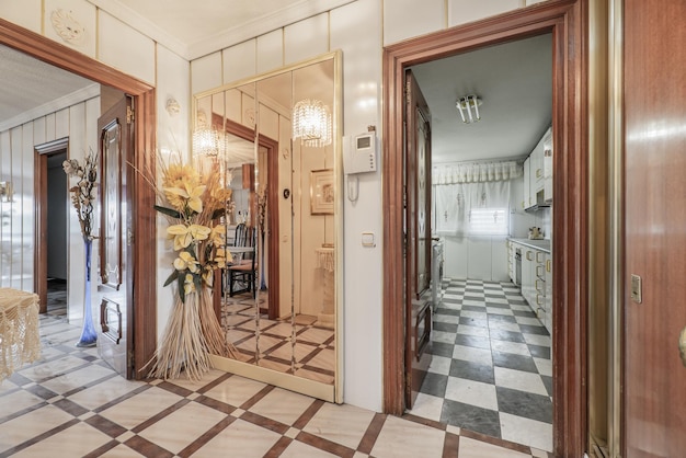 Large hall of an empty house with parquet floors