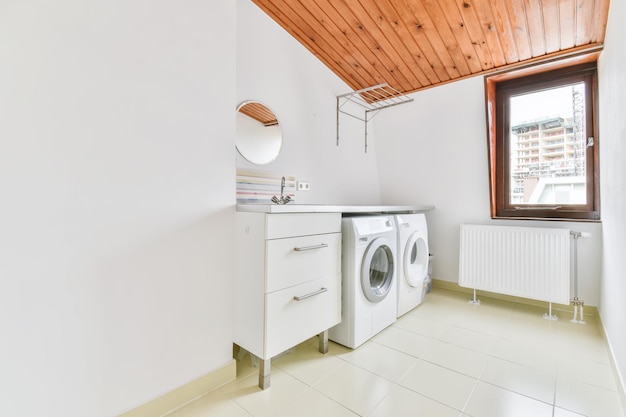 Large laundry room with washer and dryer