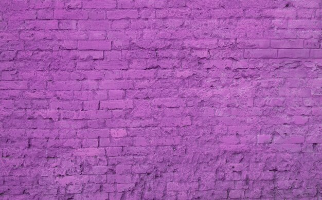 A large lilac wall made of bricks.