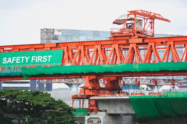 Large machinery is under construction building a railway station, Transport in Bangkok Thailand.