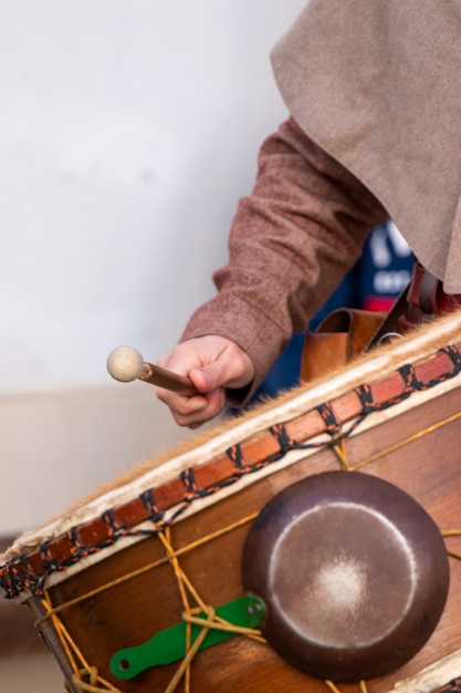 Large medieval drum player