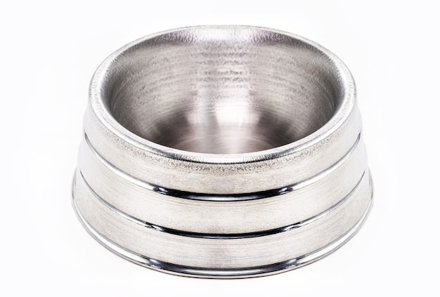 Large metal pet bowl, large pet food dish on isolated white background.