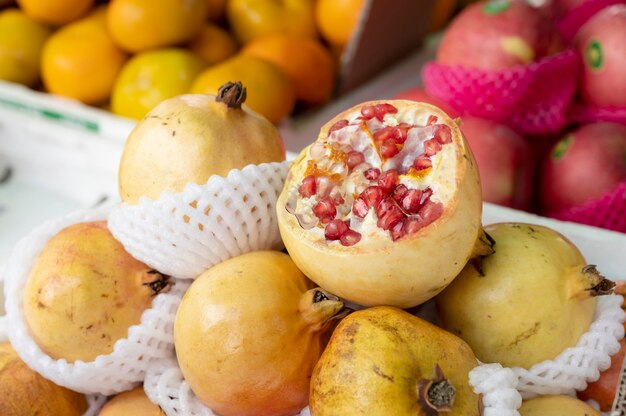 A large number of fresh pomegranates