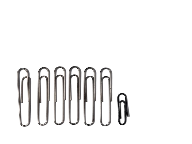 Large paper clips on a white background Office supplies isolate Paper fastening Paper clips