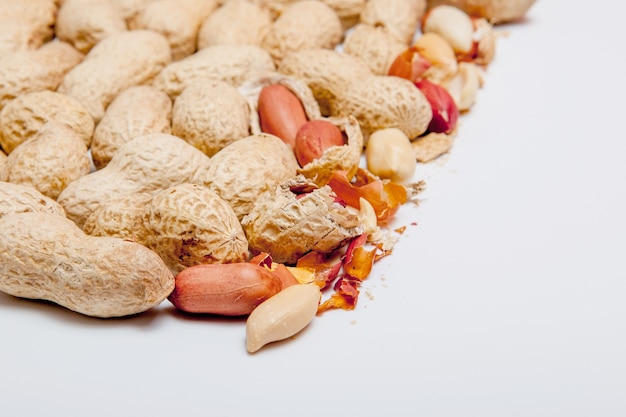 Large peeled peanuts close-up of beans in the shell