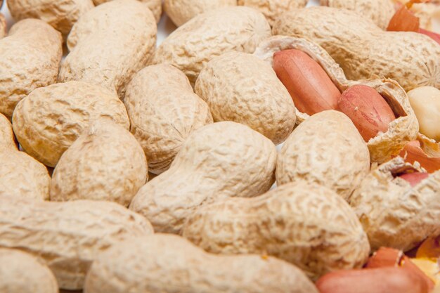 Large peeled peanuts closeup of beans in the shell